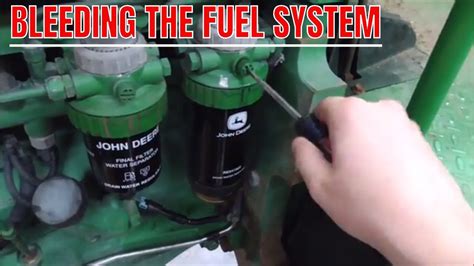 bleeding john deere 317 skid steer fuel system|john deere bleeding air.